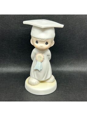Precious Moments “God Bless You Graduate" figurine